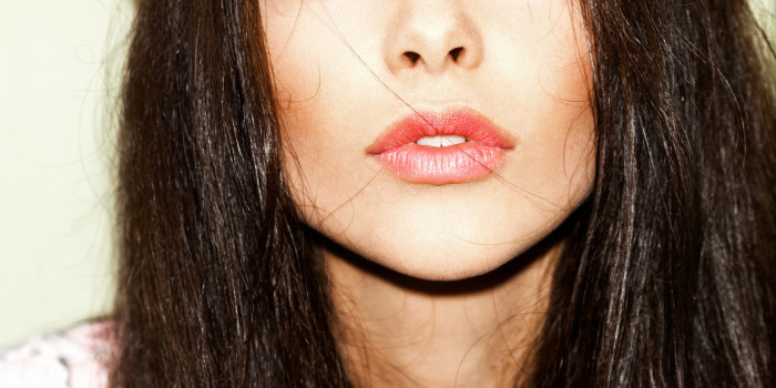 Girl with Flawless Skin in a Summer Straw Hat - Best Beauty Item for the Beach